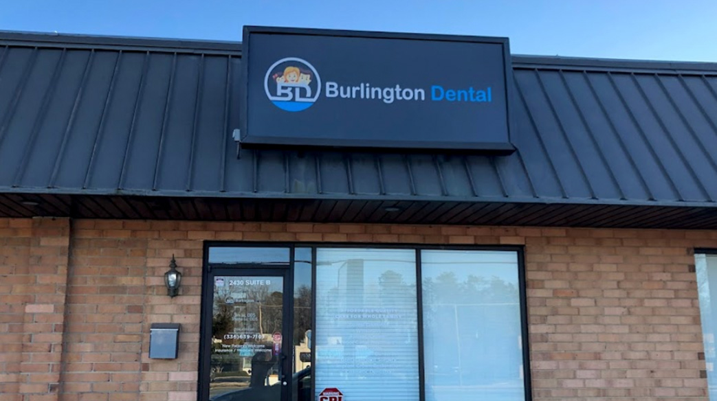 The image shows a storefront with the name  Burlington Dental  displayed on a sign, indicating it is a dental clinic.